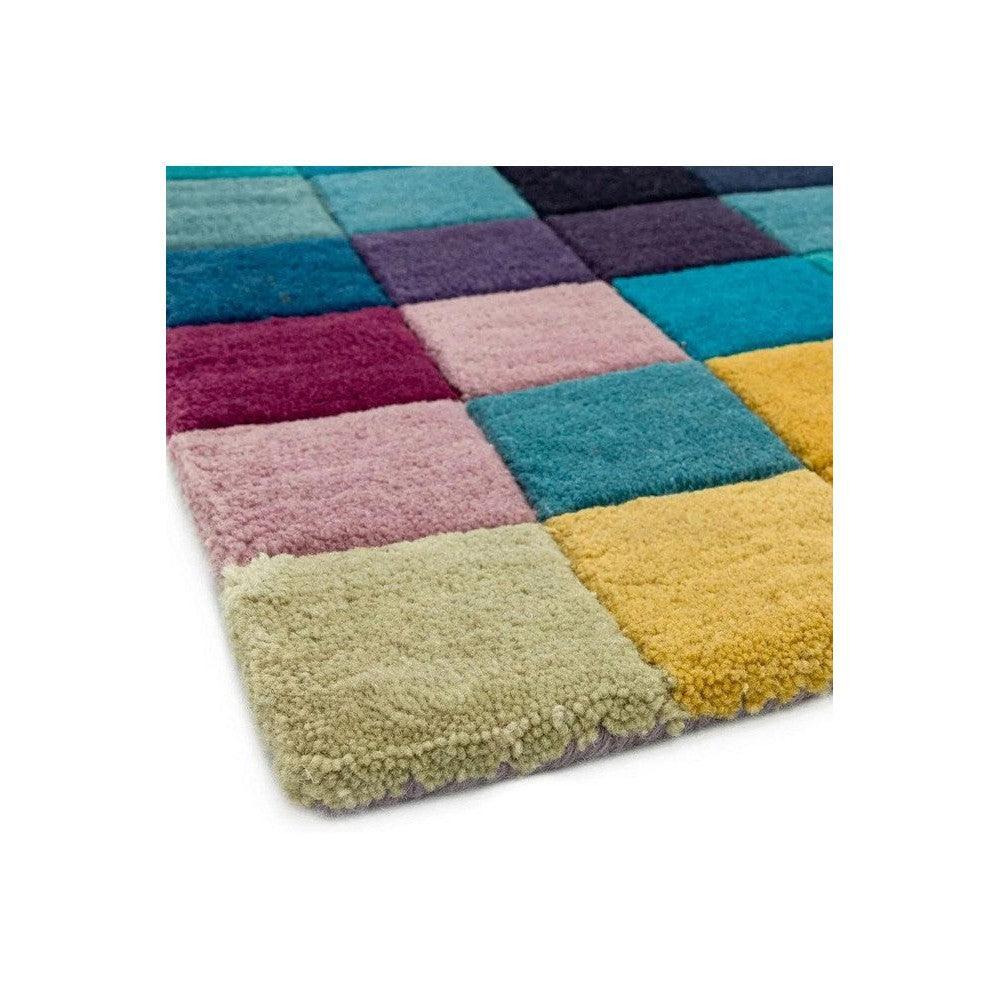 Asiatic Funk Multi Designer Rug featuring patchwork squares in teal, turquoise, blue, purple, pink, yellow, beige and cream on white background, hand-tufted wool