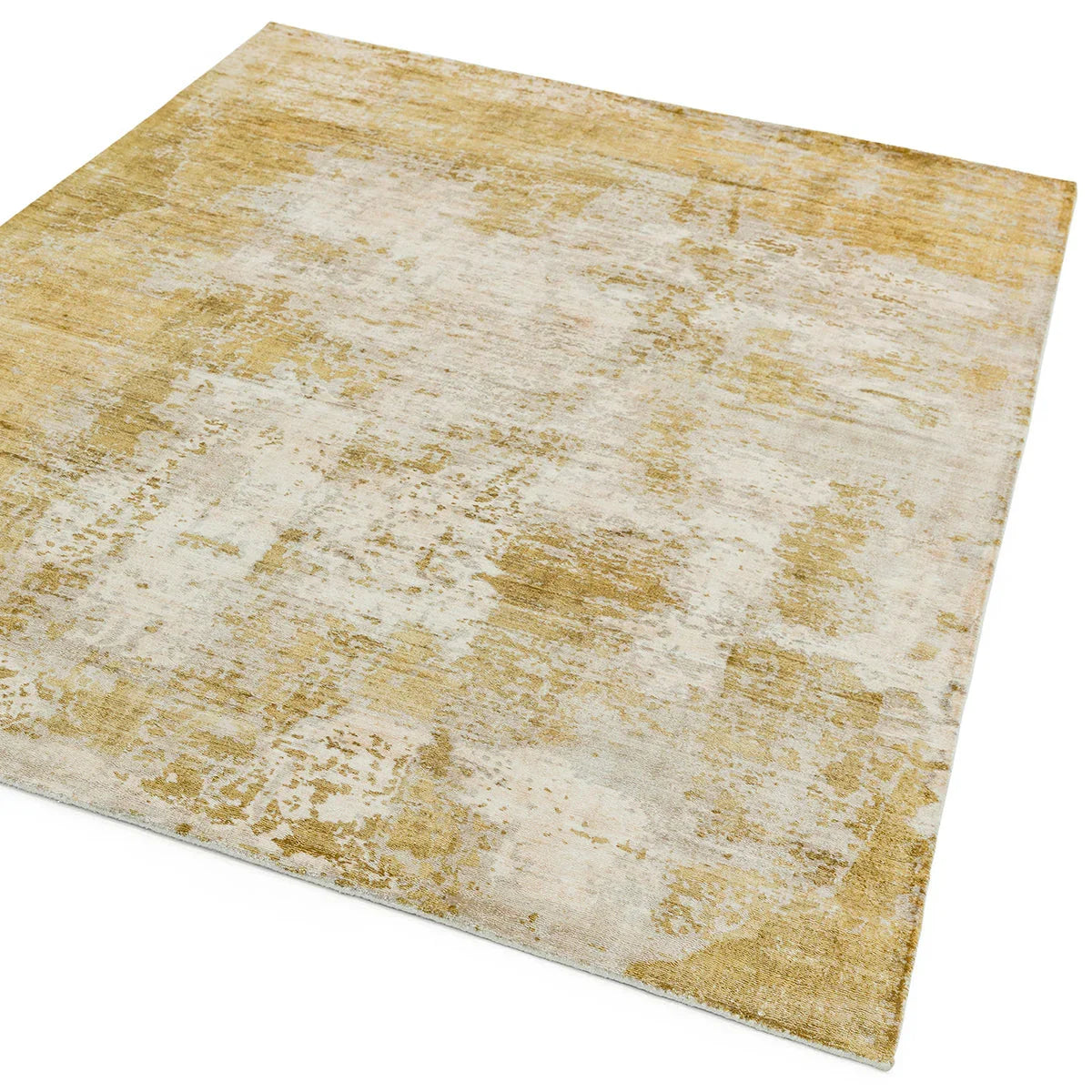 Asiatic Gatsby Autumn rug featuring abstract distressed pattern in gold, ochre and ivory on cream background, hand-tufted wool