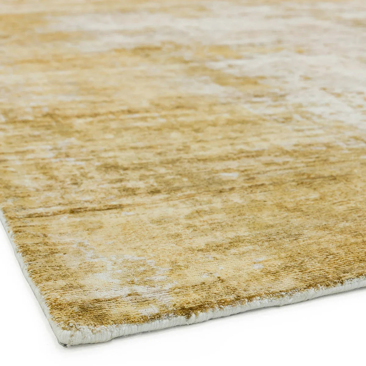 Asiatic Gatsby Autumn Rug featuring distressed abstract pattern in warm amber, cream and taupe on light ivory background, machine-made wool
