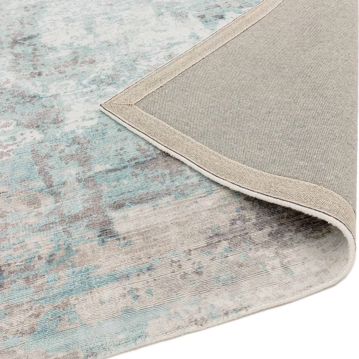 Asiatic Gatsby Blue Designer Rug featuring abstract distressed pattern in sky blue, teal and beige on ivory background, hand-tufted wool