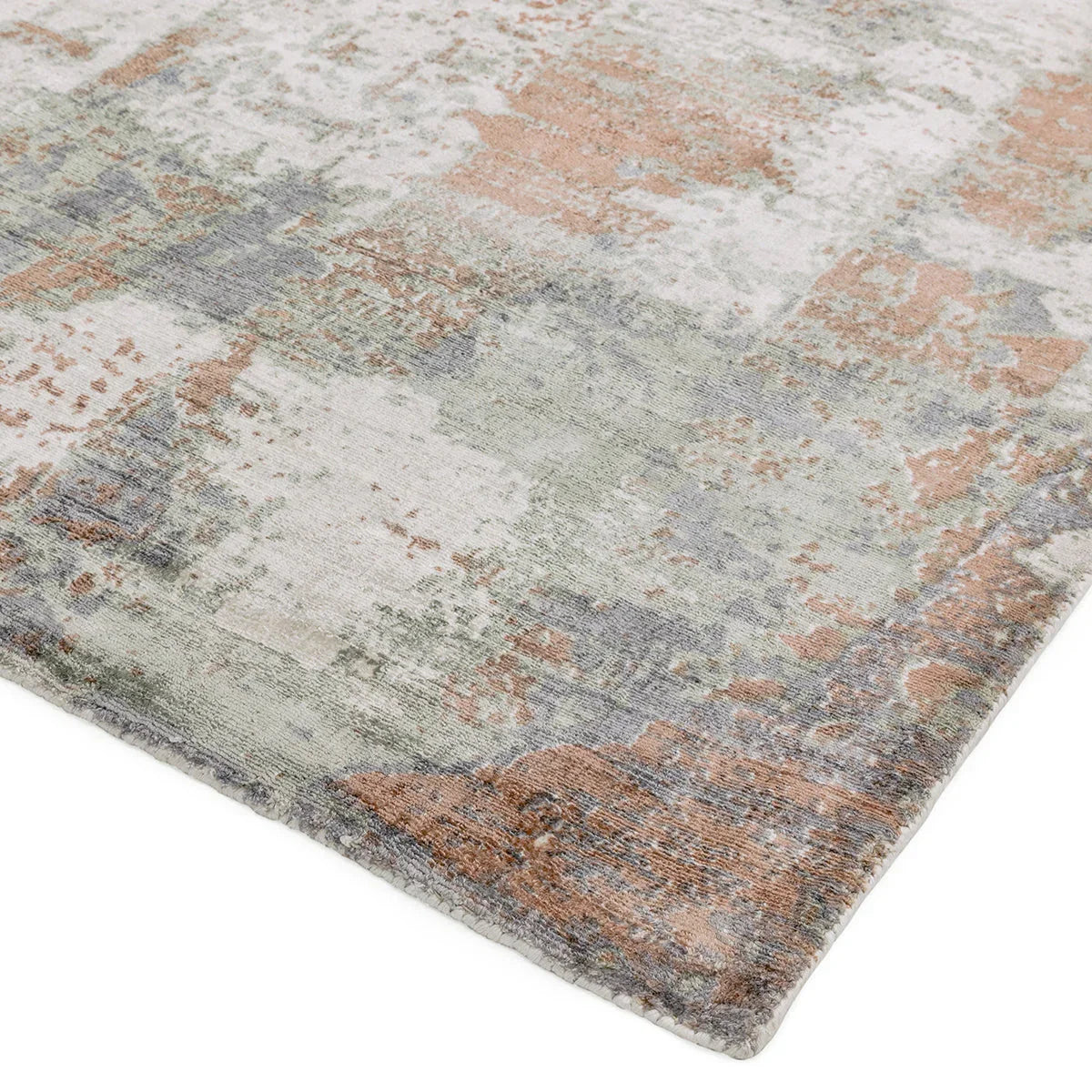 Asiatic Gatsby Coral Designer Rug featuring distressed abstract pattern in coral, sage, blue and ivory on pale background, machine-made rug