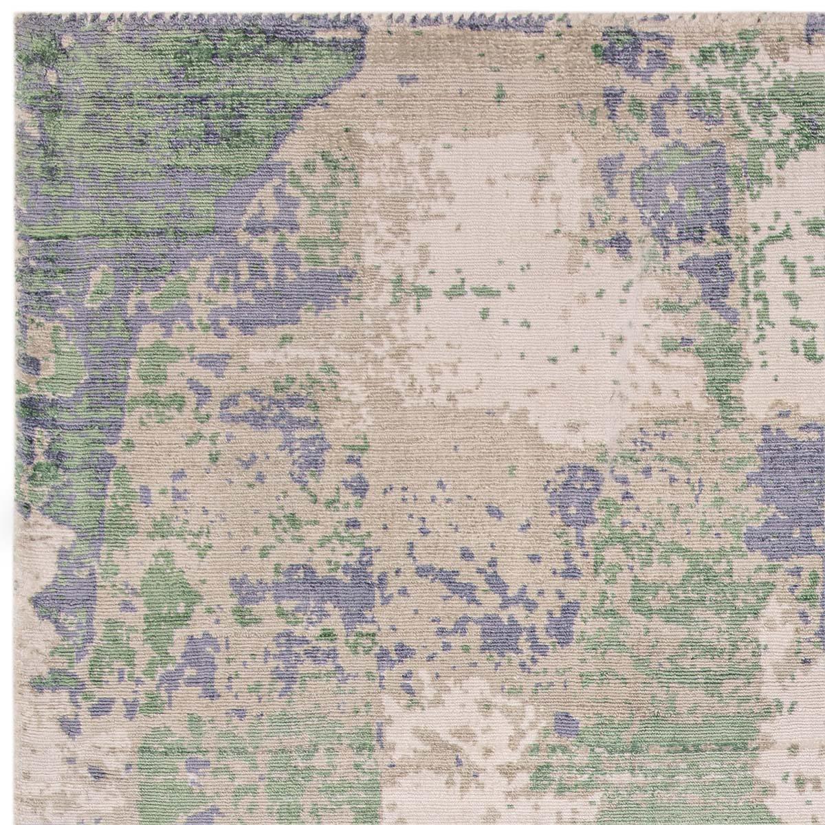 Asiatic Gatsby Green Designer Rug featuring abstract distressed pattern in sage green, lavender, beige on cream background, hand-tufted wool