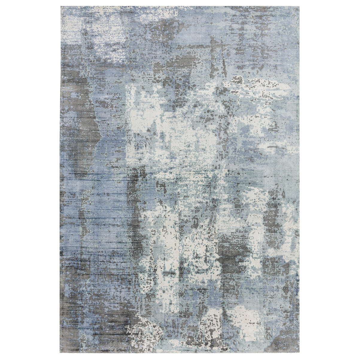 Abstract patterned rug with blue and gray tones on a white background