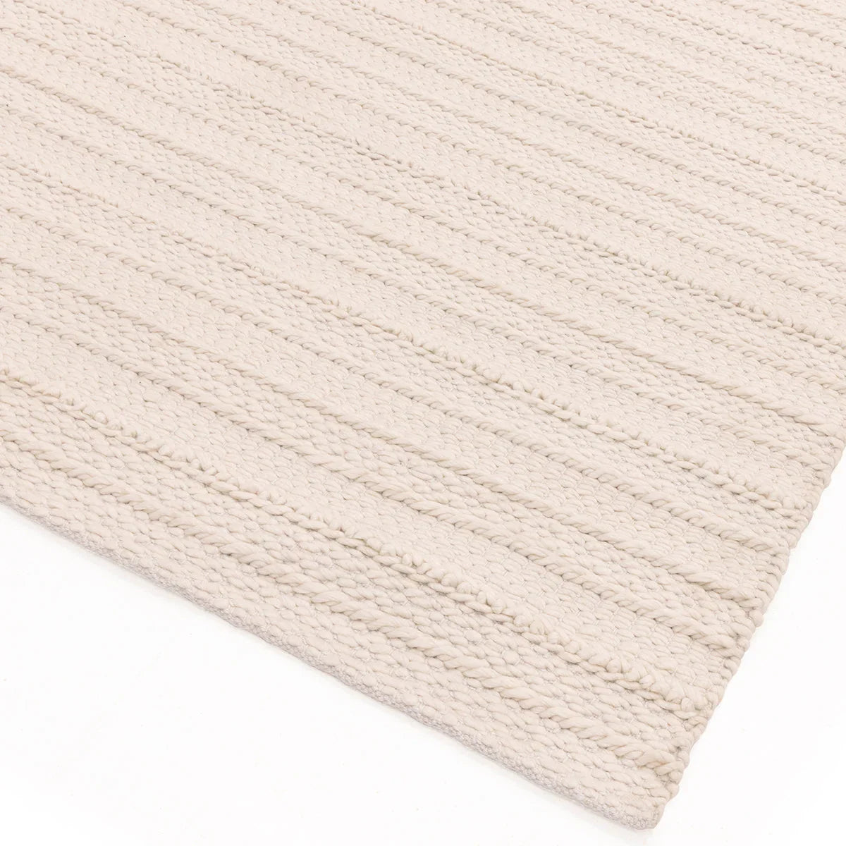 Asiatic Grayson Cream Designer Rug featuring textured braided pattern in cream and ivory on white, hand-tufted wool