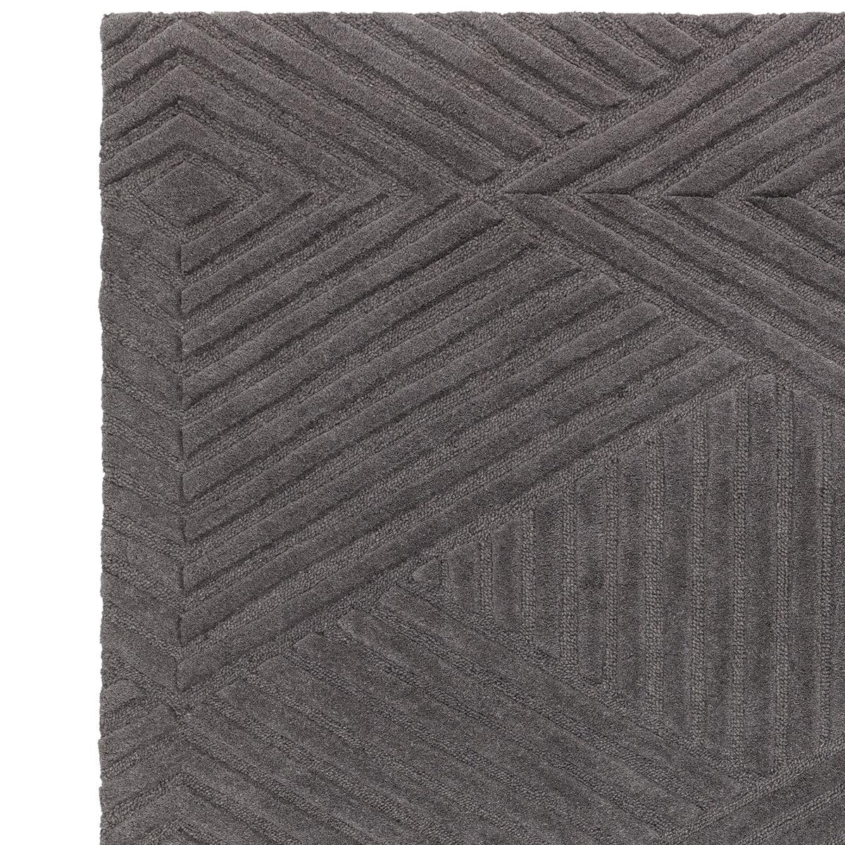 Asiatic Hague Charcoal Rug featuring geometric chevron pattern in charcoal grey, gunmetal, slate on white background, machine-woven polypropylene