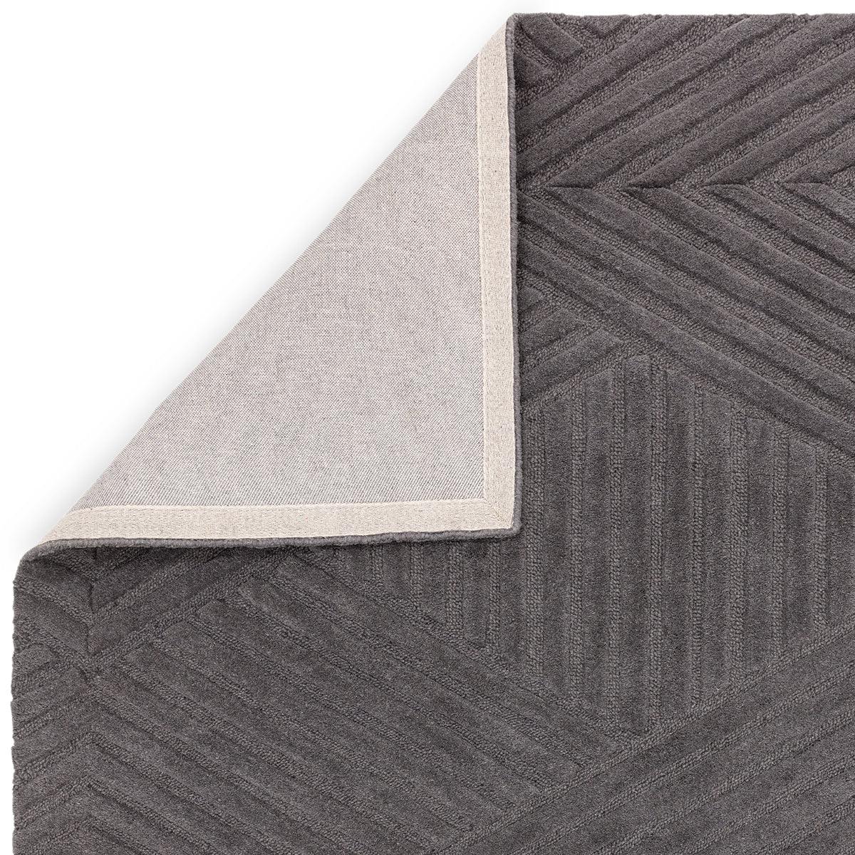 Asiatic Hague Charcoal Designer Rug featuring geometric chevron pattern in charcoal grey on light beige backing, power-loomed polypropylene