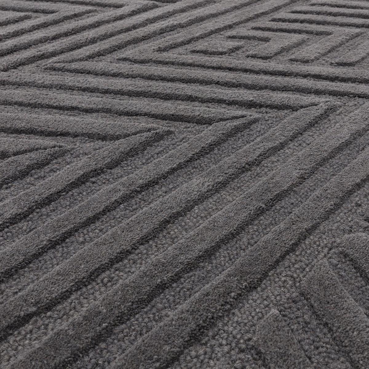 Asiatic Hague Charcoal Designer Rug featuring ribbed diagonal stripe pattern in charcoal grey and gunmetal on charcoal background, hand-tufted wool
