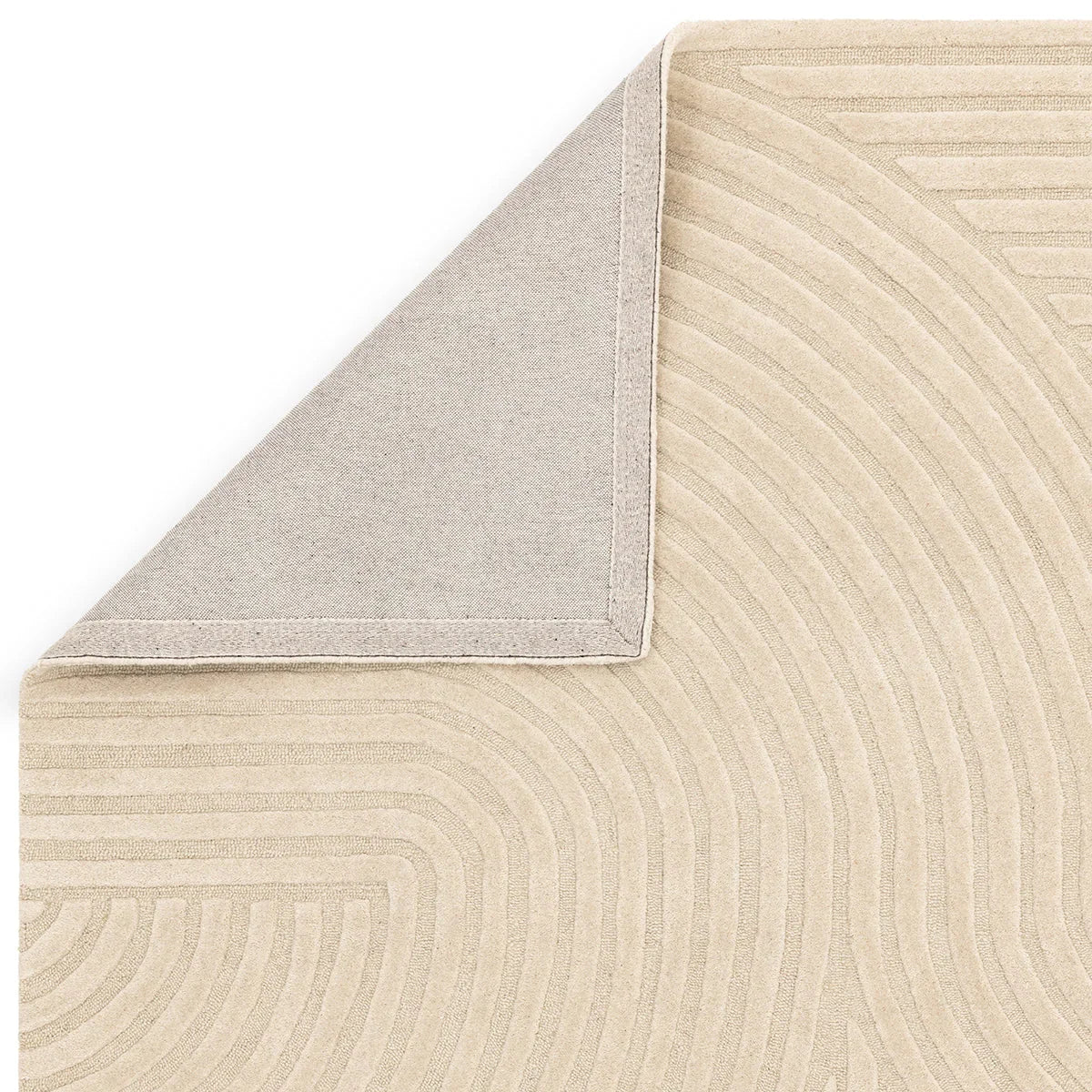 Asiatic Hague Sand Designer Rug featuring curved line pattern in sand and cream on beige background, machine-woven wool