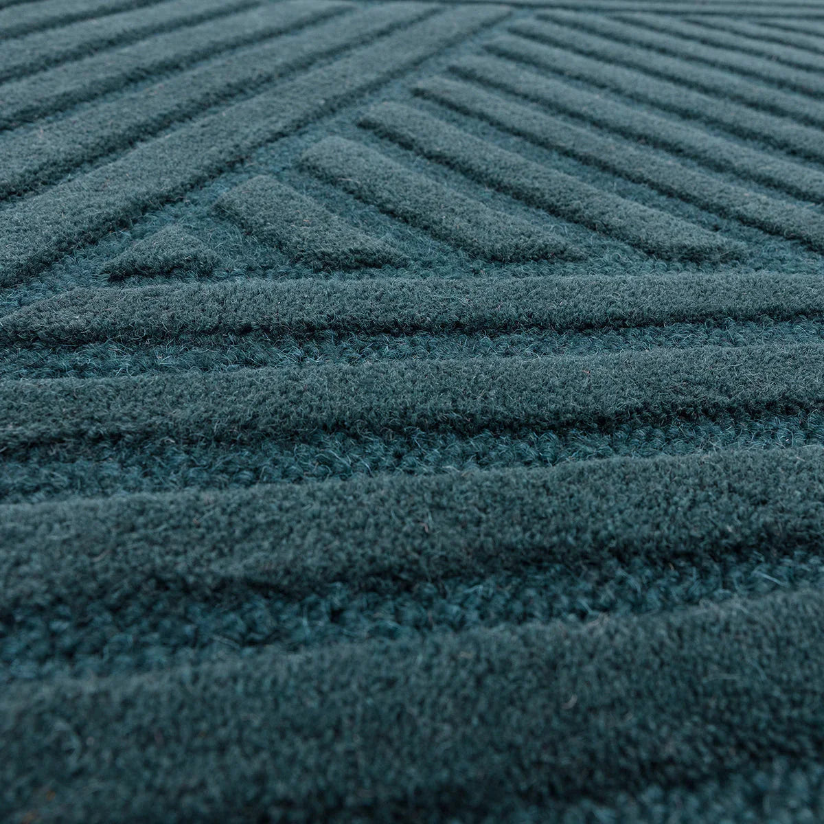 Asiatic Hague Teal Designer Rug featuring ribbed striped pattern in teal on teal background, hand-tufted wool
