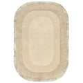 Beige oval rug with a textured border on a white background