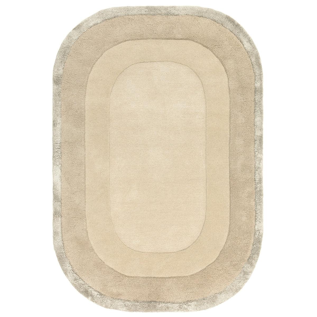 Beige oval rug with a textured border on a white background