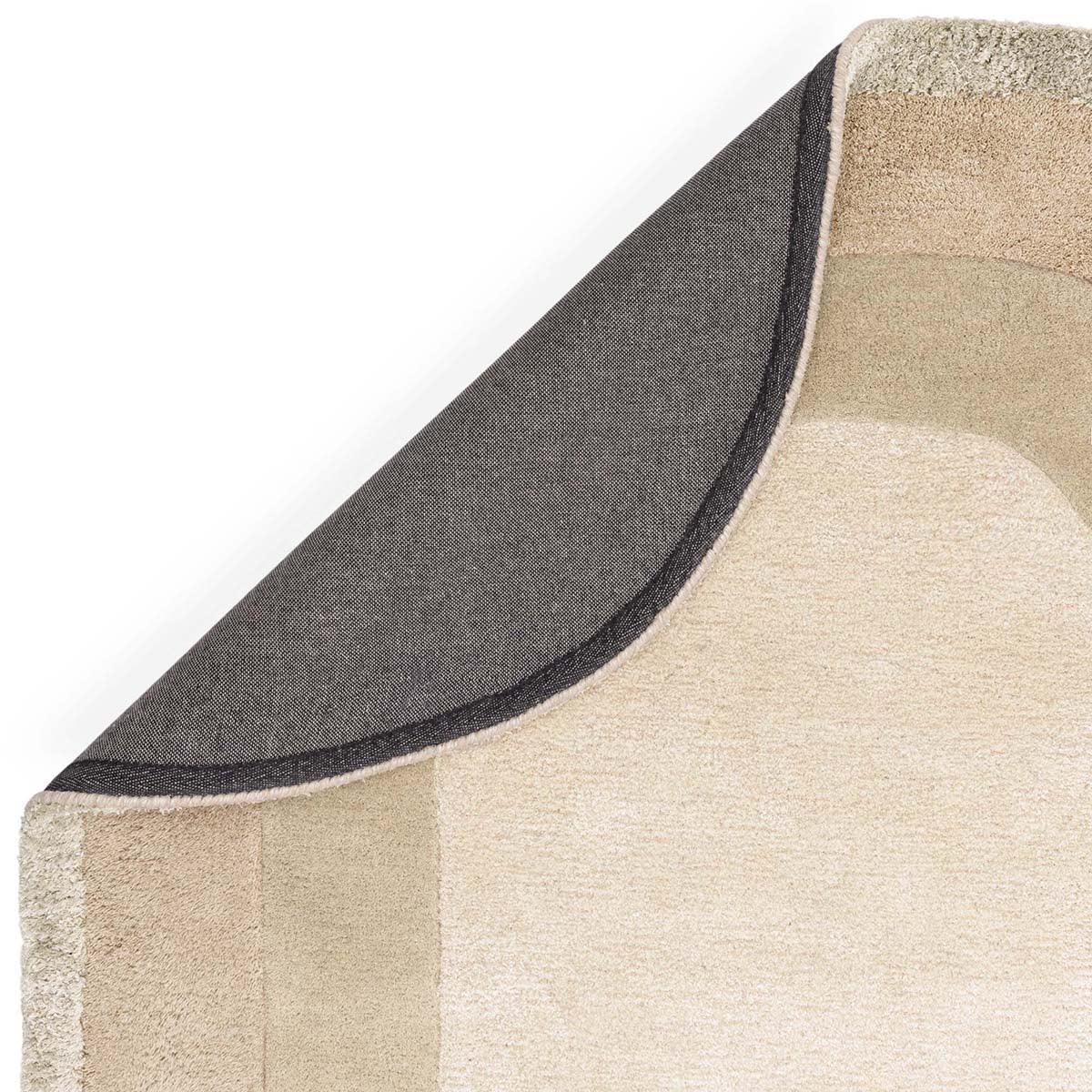 Asiatic Halo Calico Designer Oval Rug featuring beige, cream, taupe and charcoal blocks on light beige background