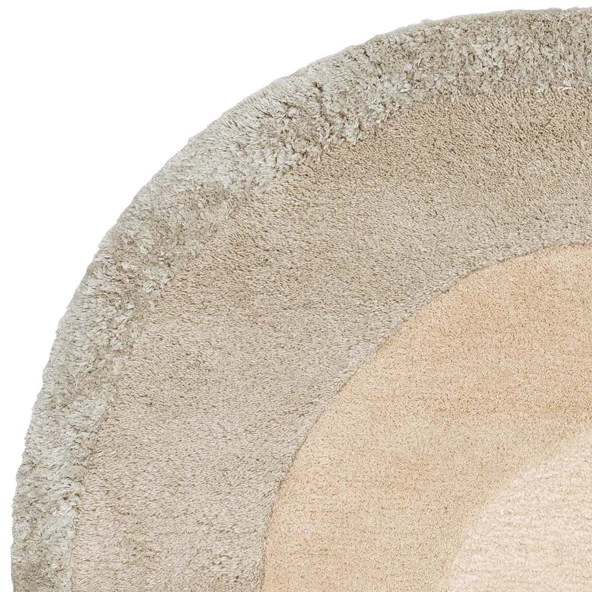 Asiatic Halo Calico Oval Rug featuring textured border in taupe, camel and cream on ivory background, machine-made wool