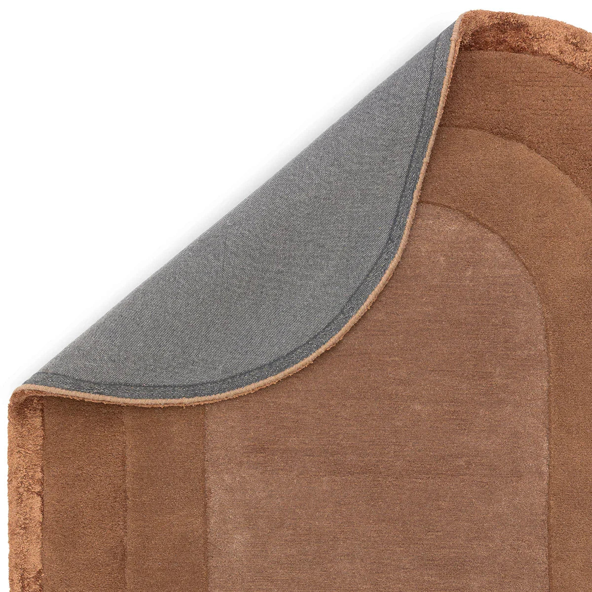 Asiatic Halo Clay Designer Oval Rug by Asiatic Carpets London—solid brown pile with grey underlay, hand-tufted wool