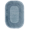 Rectangular blue rug with a gradient pattern on a white background