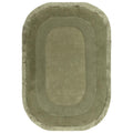 Oval green rug with a textured pattern on a white background