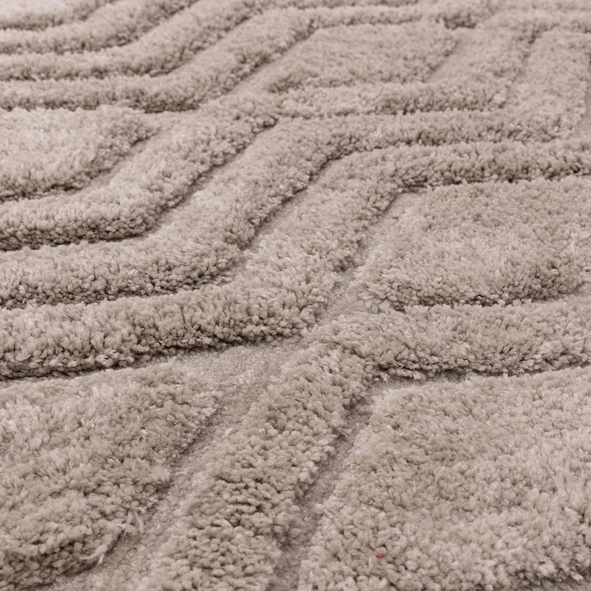 Asiatic Harrison Greige Rug featuring shaggy ribbed pattern in greige, taupe and cream on beige background, hand-tufted wool