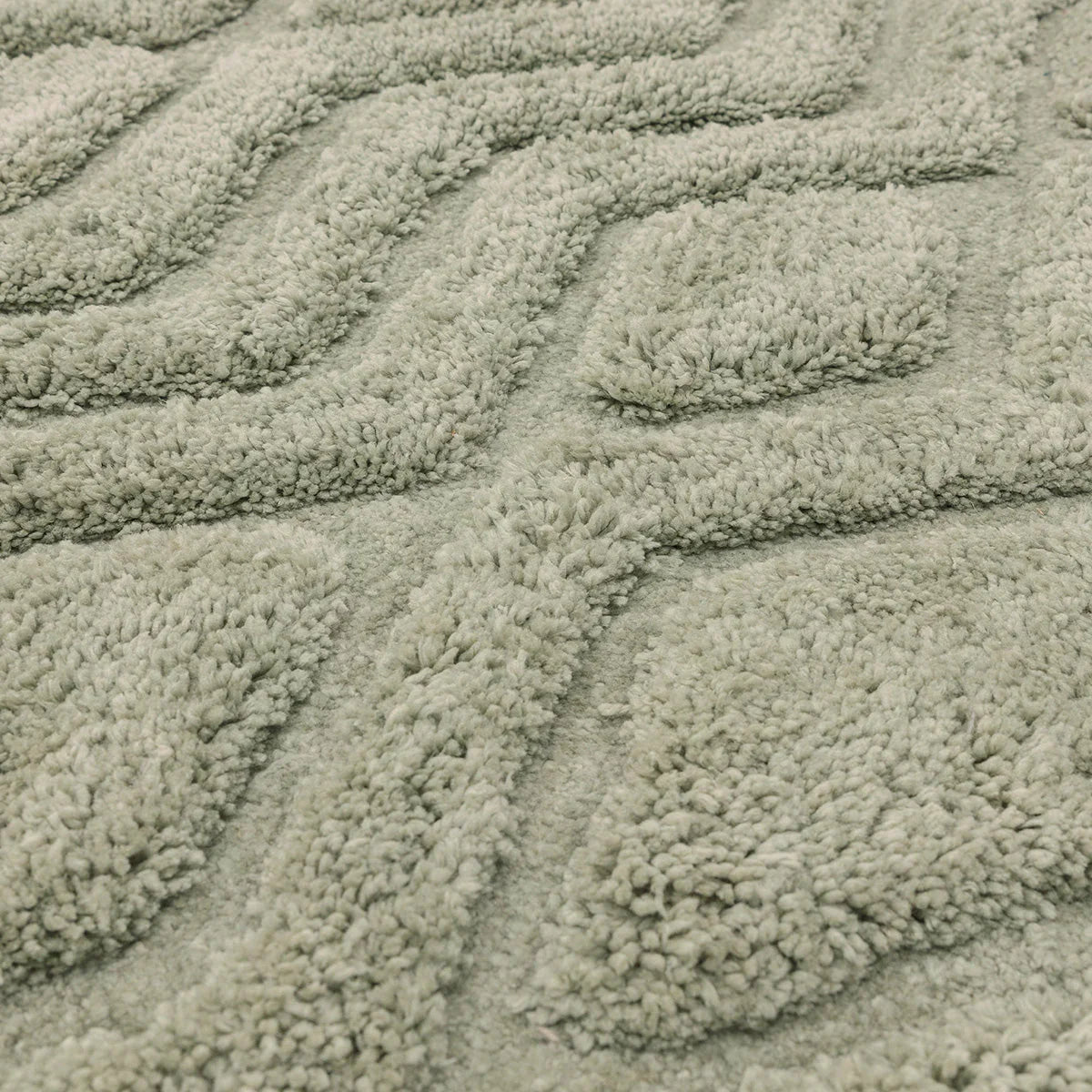 Asiatic Harrison Sage Designer Rug featuring shaggy texture in sage green, grey-green and cream on soft sage background, hand-tufted wool