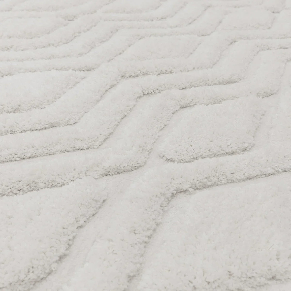 Asiatic Harrison Off White Designer Rug featuring abstract wavy pattern in cream and beige on ivory background, hand-tufted wool