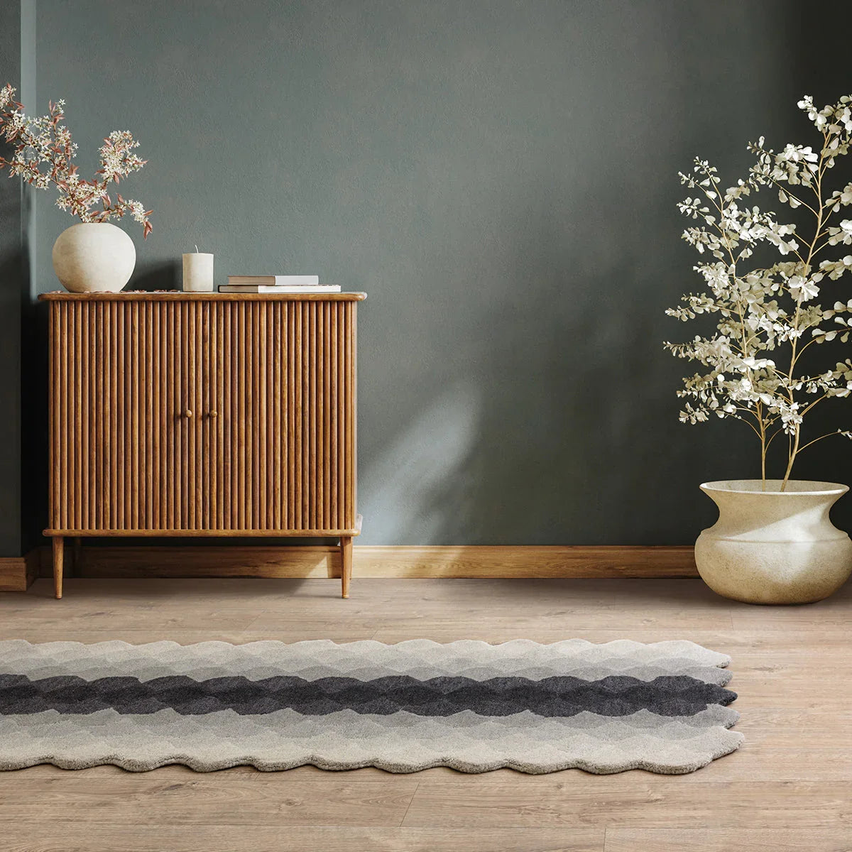 Asiatic Hive Charcoal Runner Rug featuring a cream background with beige, grey and charcoal wavy stripes, tufted wool