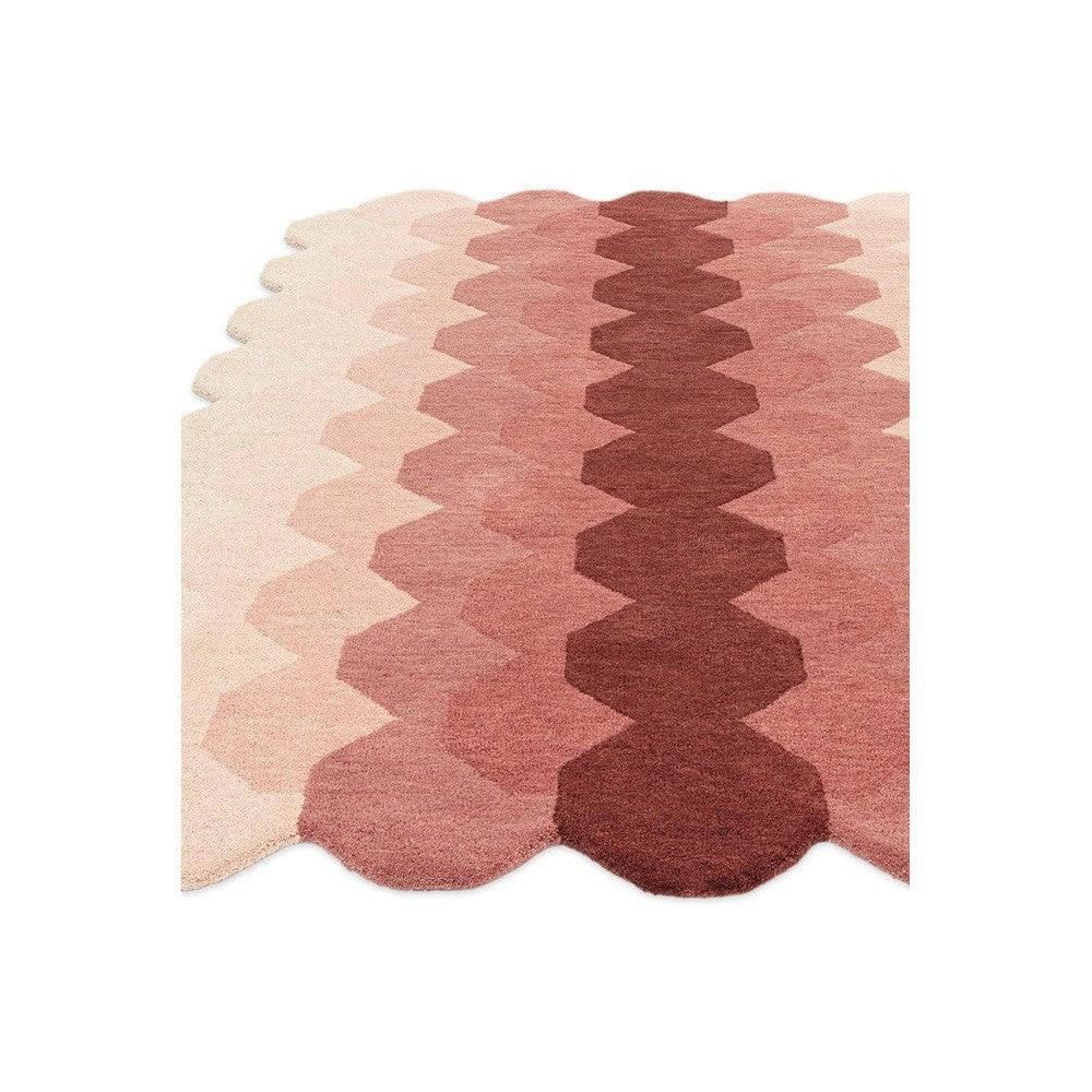 Asiatic Hive Pink Designer Rug featuring hexagon hive pattern in blush pink, light pink, rose and burgundy on white background, machine-woven polyester
