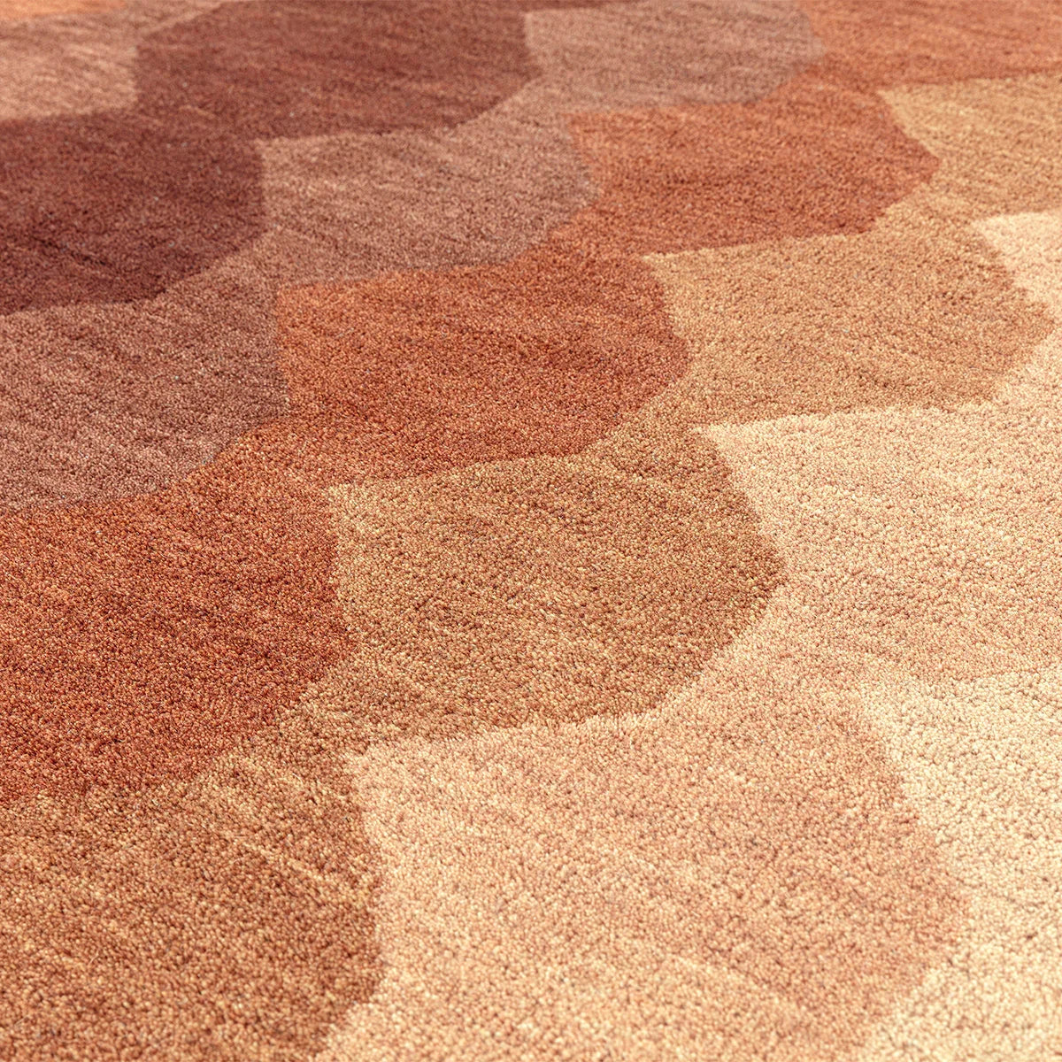 Asiatic Hive Rust Runner rug featuring honeycomb hex pattern in rust, brick red, beige on cream, tufted wool