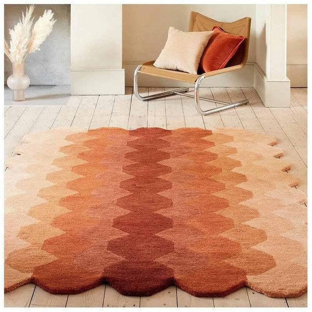 Asiatic Hive Rust Designer Rug featuring geometric honeycomb pattern in rust, terracotta and peach on pale beige background, hand-tufted wool
