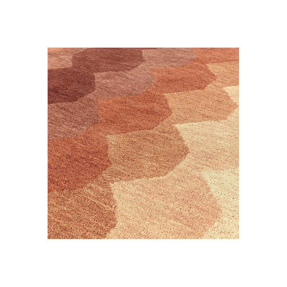 Asiatic Hive Rust Designer Rug featuring geometric honeycomb pattern in rust, copper, taupe on warm beige background, hand-tufted wool