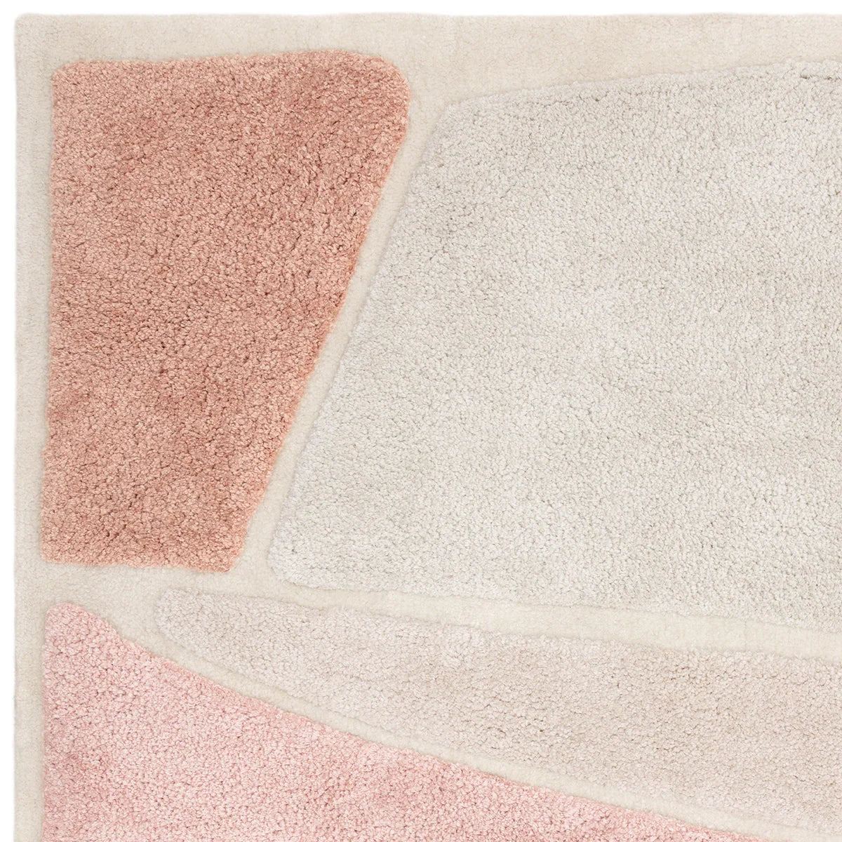 Asiatic Horizon Clay rug featuring geometric blocks in blush pink and ivory on cream ground, hand-tufted wool