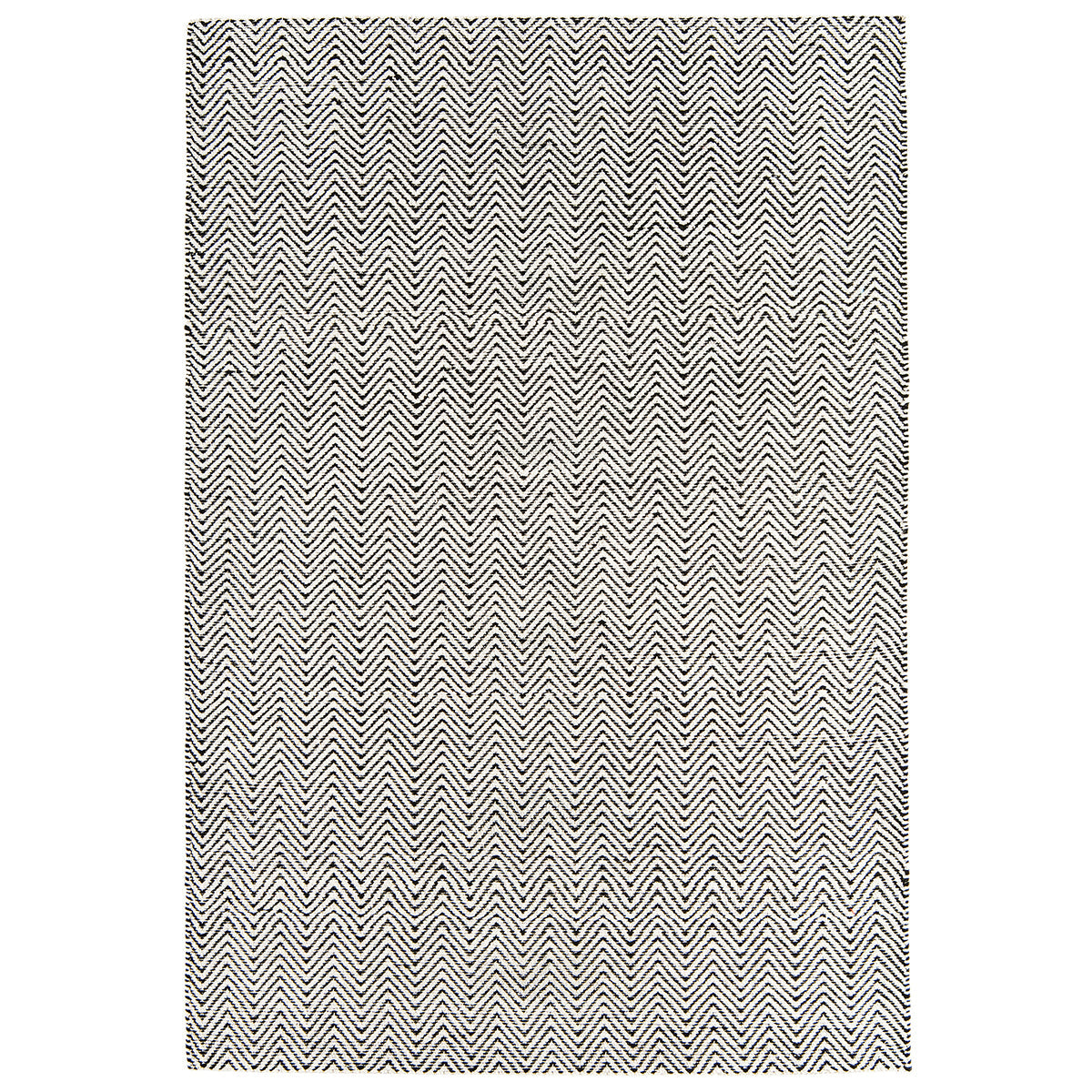 Black and white zigzag patterned rug on a white background