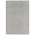 Black and white zigzag patterned rug on a white background