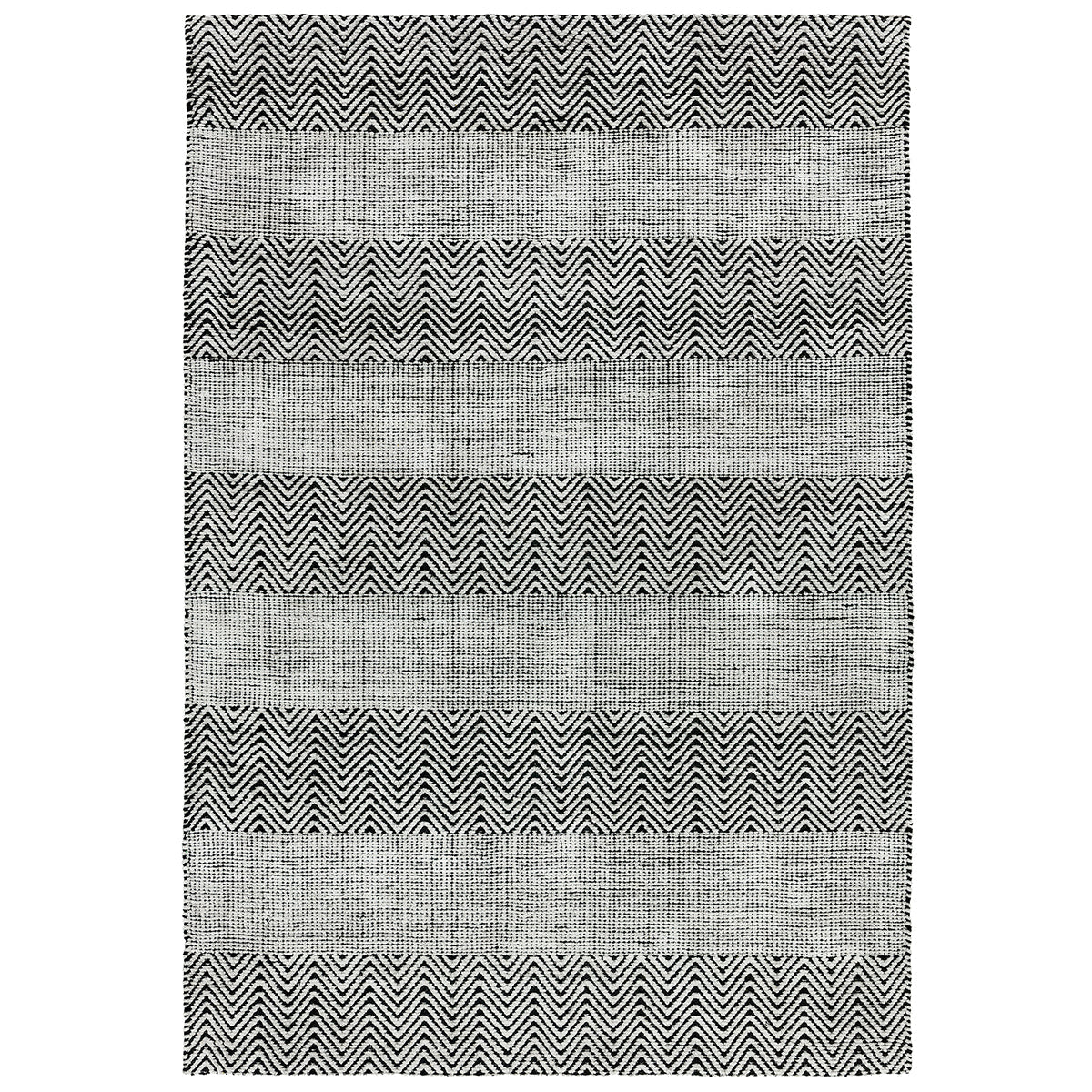 Rug with black and white striped pattern on a white background