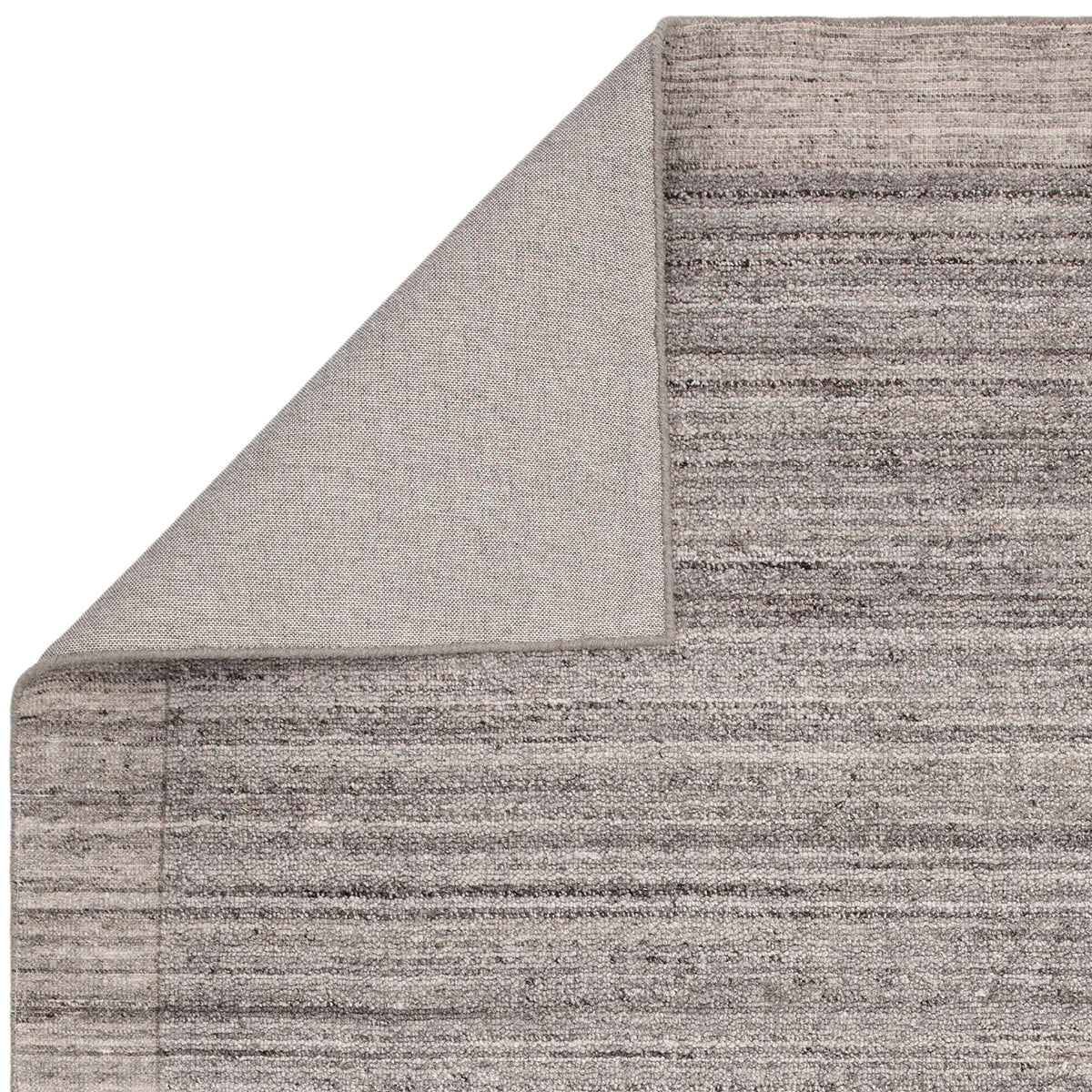 Asiatic Larson Charcoal Designer Rug featuring striped pattern in charcoal grey, ash grey and ivory on light cream background, hand-tufted wool