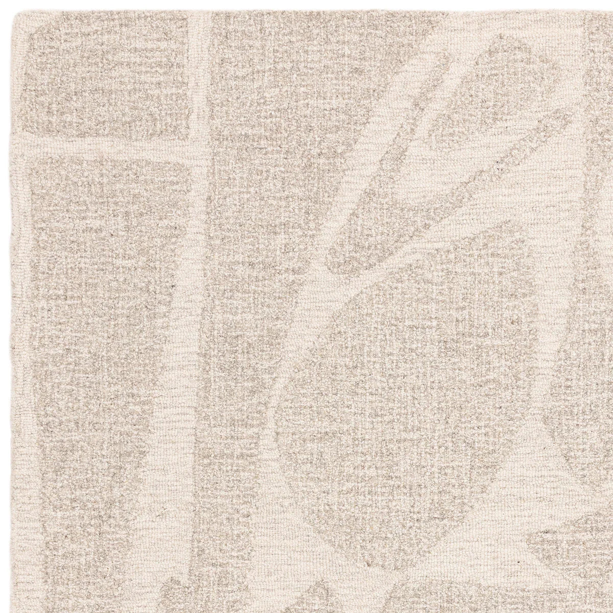 Asiatic Loxley Chalk Designer Rug featuring abstract leaf motif in beige, ivory and cream on light chalk background, hand-tufted wool