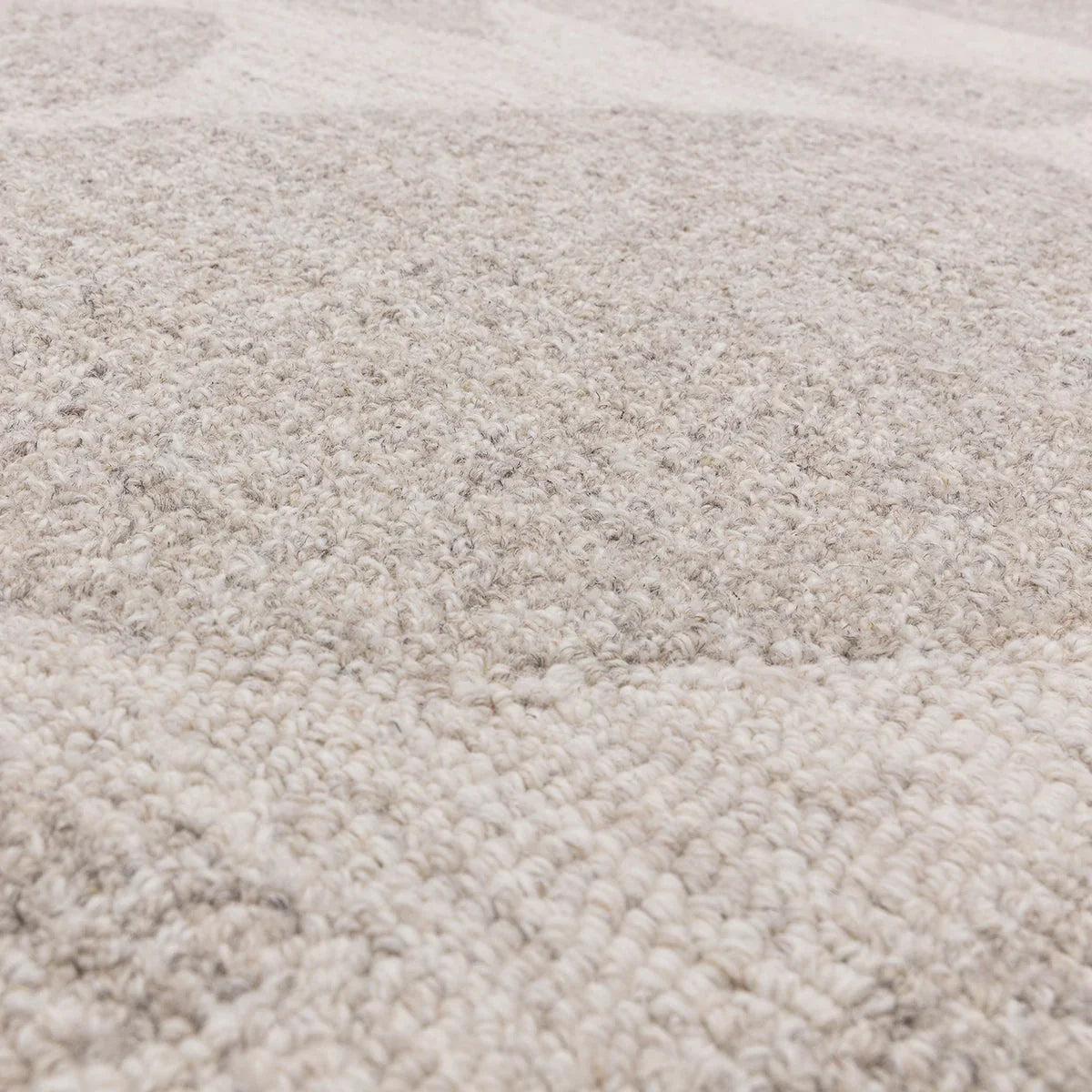 Asiatic Loxley Chalk Designer Rug featuring solid textured pile in cream, beige and taupe on light chalk background, hand-tufted wool