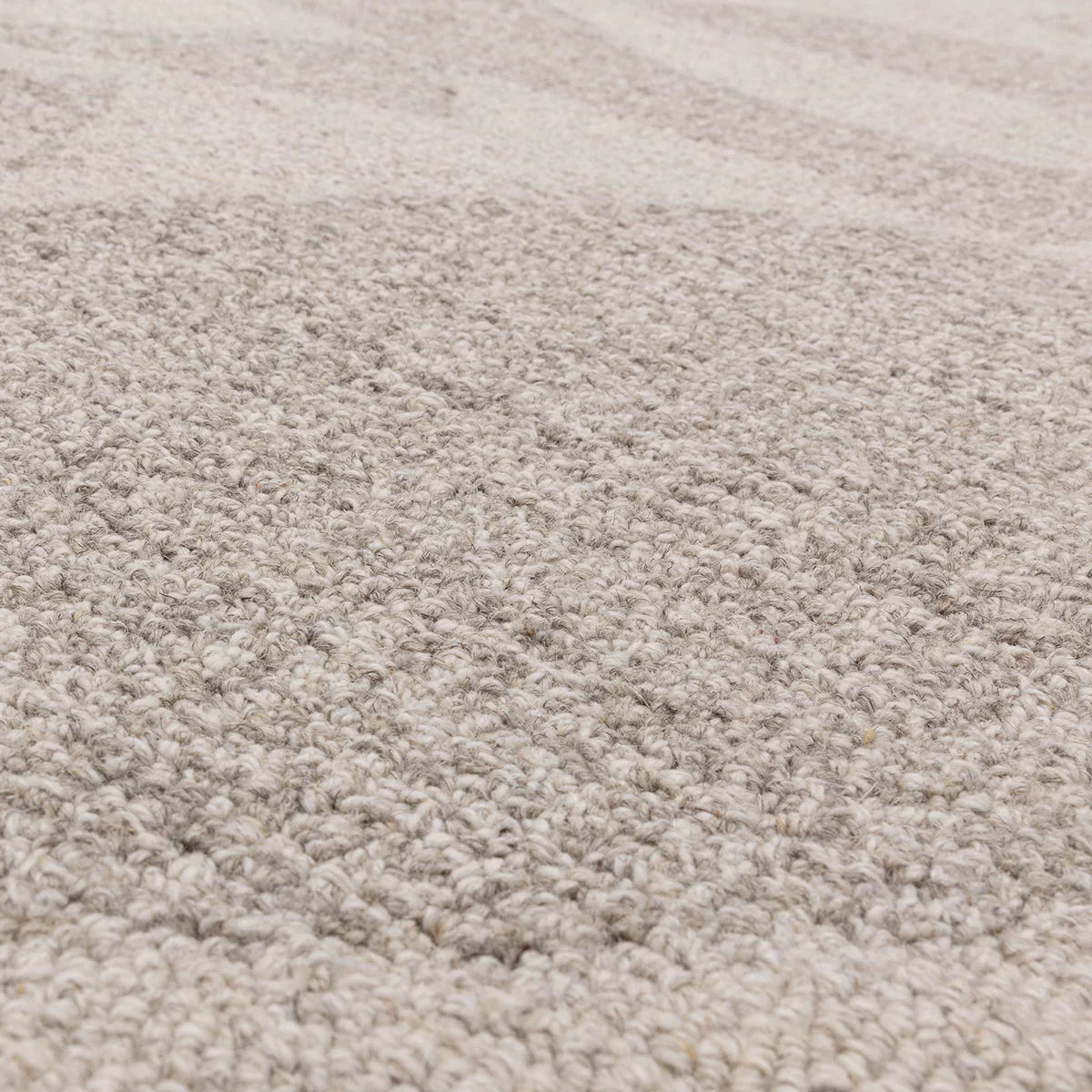 Asiatic Loxley Linen Designer Rug featuring textured solid pattern in beige, cream and taupe on warm beige background, hand-tufted linen