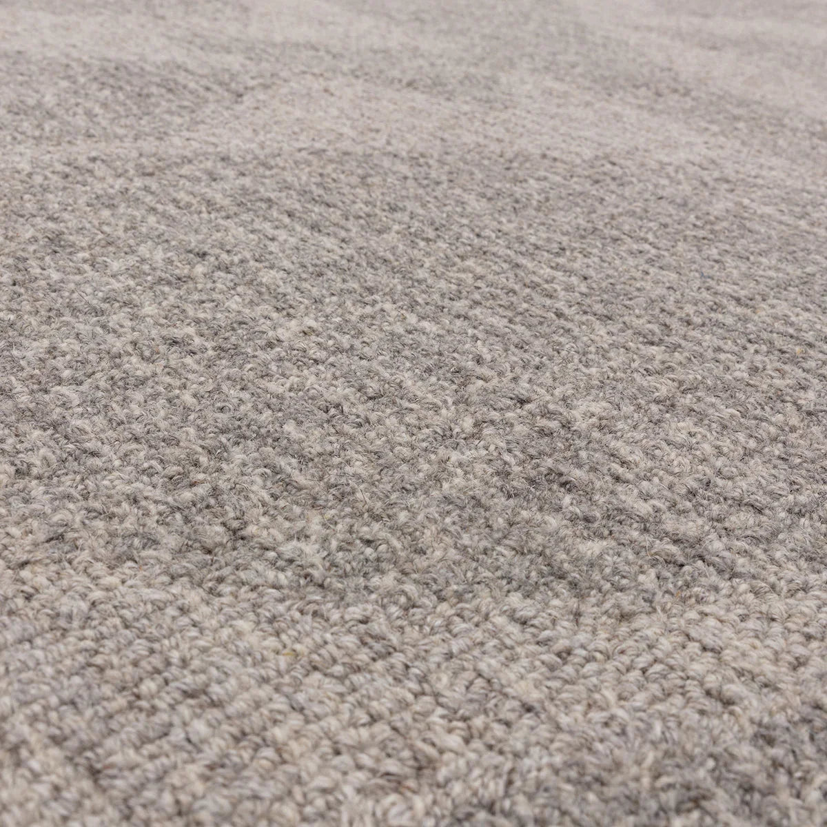 Asiatic Loxley Stone Grey Rug featuring textured shag in stone grey, ivory on pale beige, hand-tufted wool