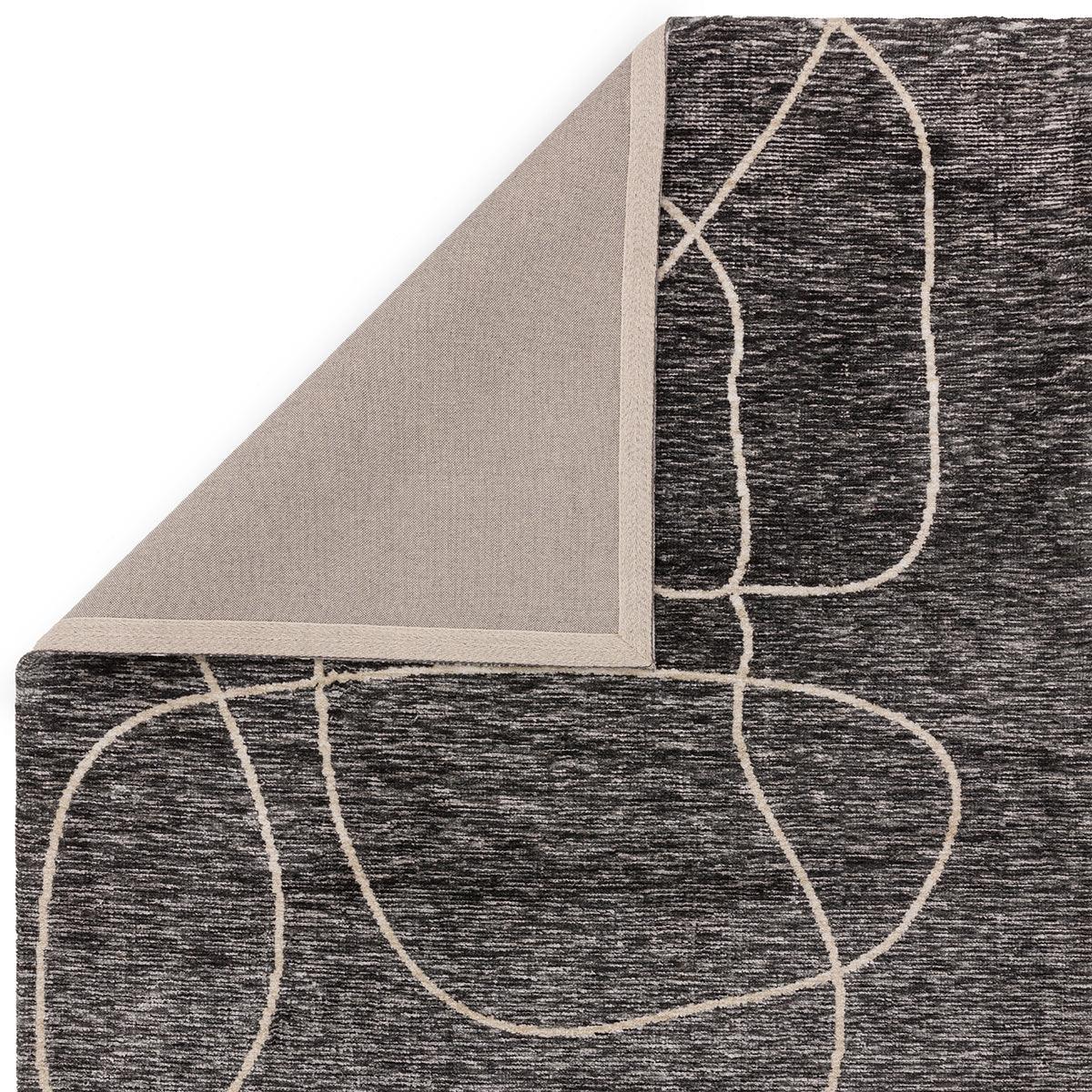 Asiatic Mason Linear Designer Rug featuring abstract linear pattern in charcoal and beige on dark charcoal background, hand-tufted wool
