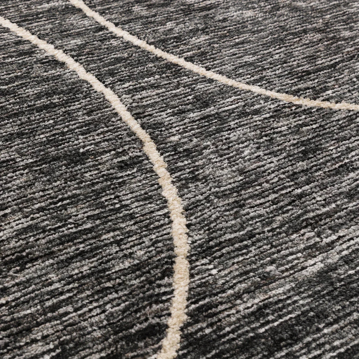 Asiatic Mason Linear Rug featuring ivory stripe lines in charcoal grey on dark grey background, machine-made polyester