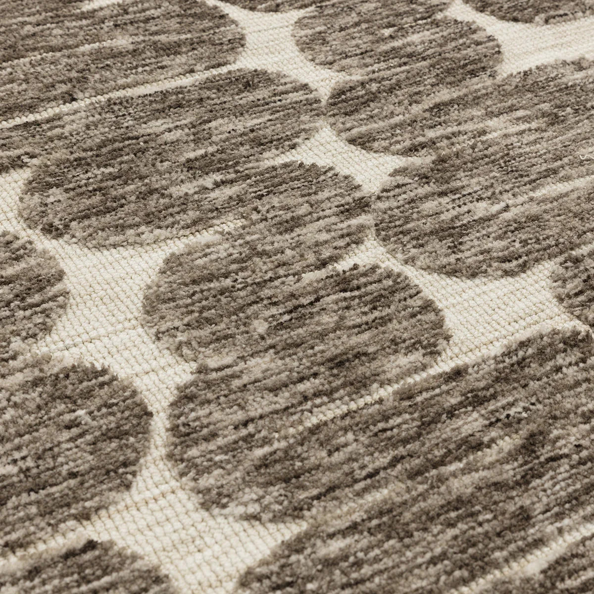 Asiatic Mason Wave Designer Rug featuring wave pattern in espresso brown, taupe and cream on beige background, hand-tufted wool