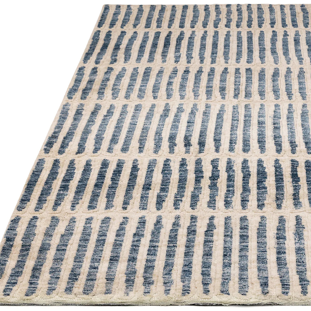 Asiatic Mason Grid Designer Rug featuring vertical brush-stroke grid in navy blue, denim blue on cream beige background, hand-tufted wool