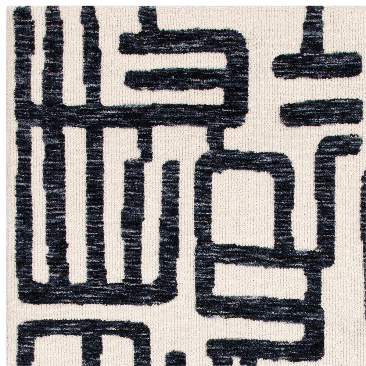 Asiatic Mason Script Designer Rug featuring abstract geometric script in navy-black on ivory cream, hand-tufted wool