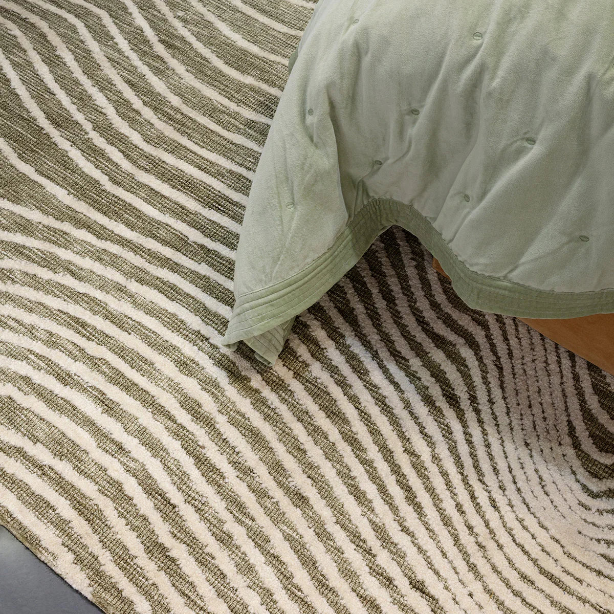 Asiatic Mason Magnitude Sage Designer Rug featuring wavy stripe pattern in cream, taupe and sage on beige background, hand-tufted wool