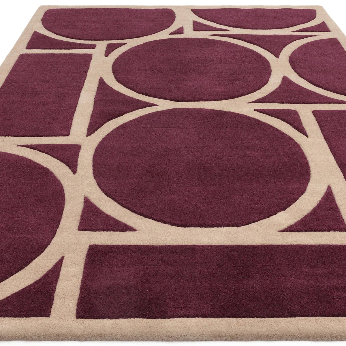 Asiatic Metro Plum Designer Rug featuring circular geometric pattern in plum and beige on cream background, machine-made polypropylene