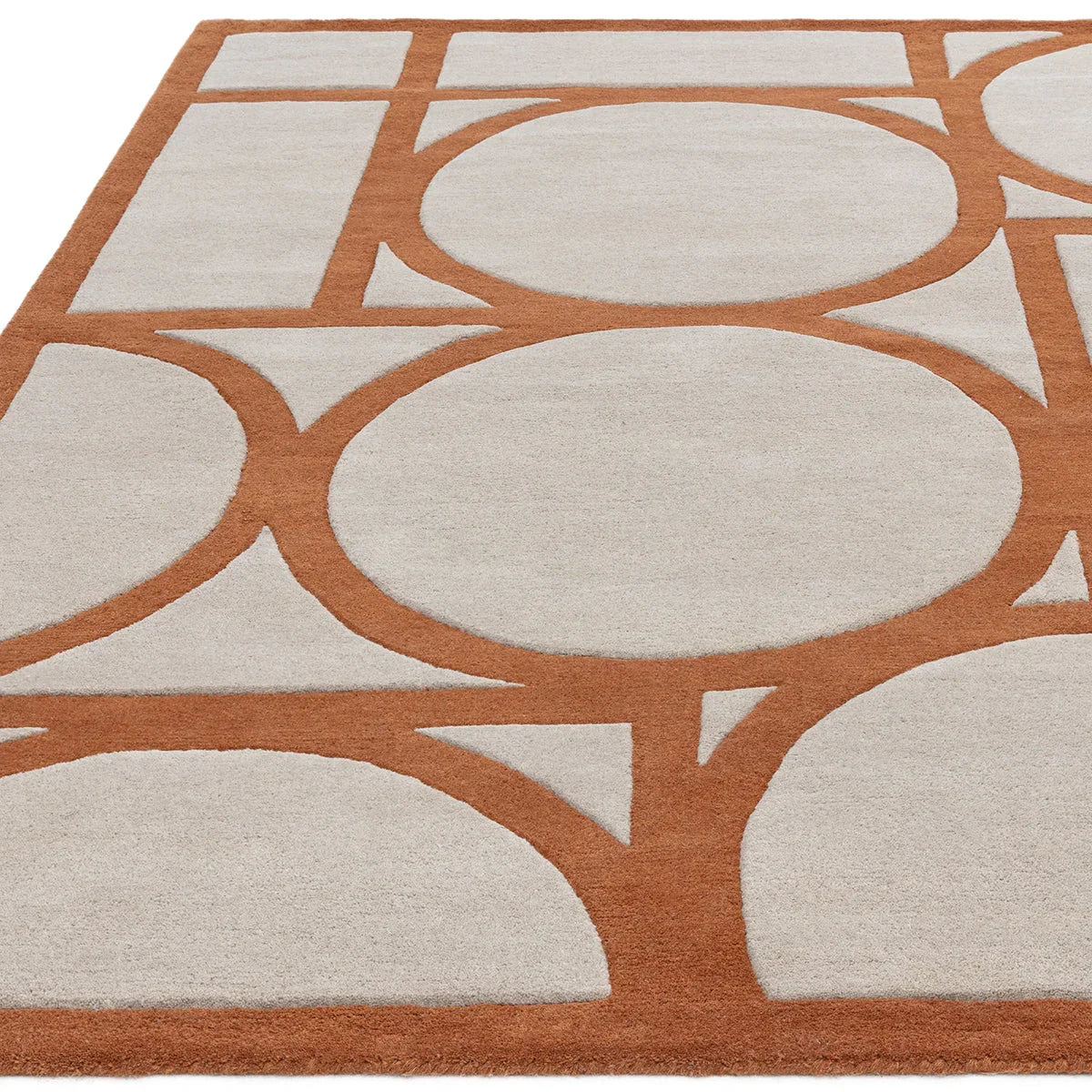 Asiatic Metro Rust Designer Rug featuring geometric circle pattern in rust orange and cream on ivory background, hand-tufted wool