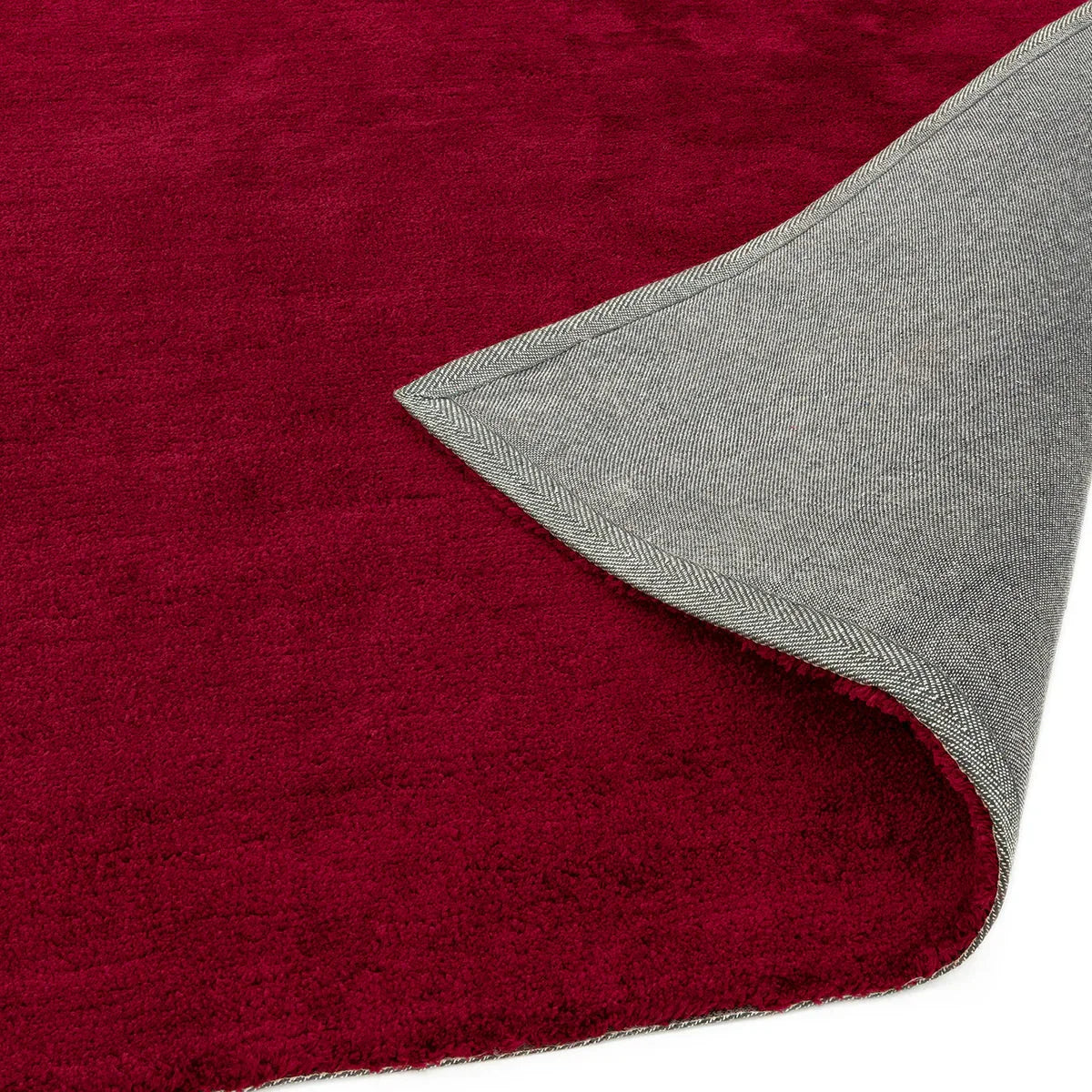 Asiatic Milo Berry Designer Rug featuring solid burgundy pile on grey backing, hand-tufted wool