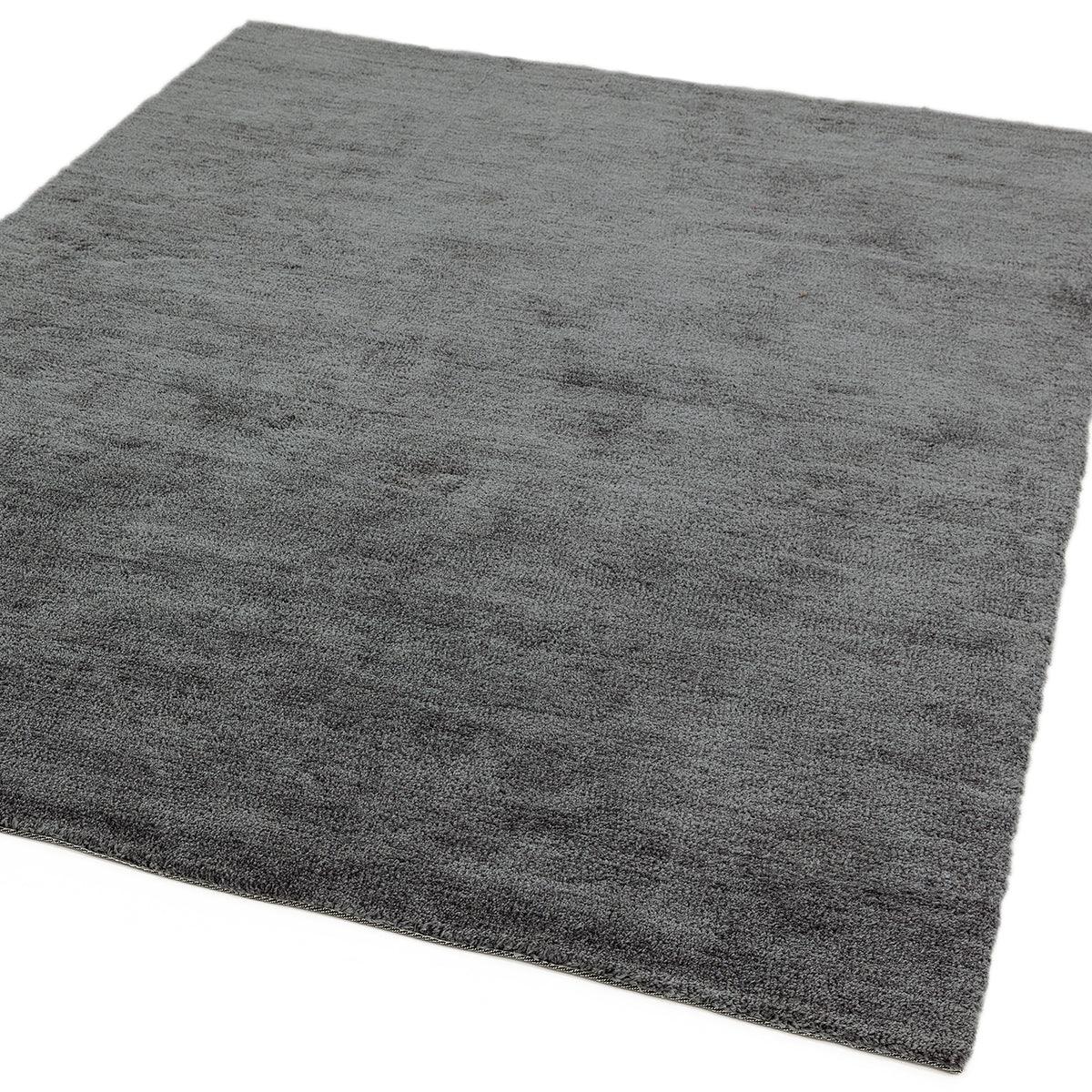 Asiatic Milo Grey Designer Rug featuring solid shaggy texture in charcoal grey on white background, hand-tufted wool