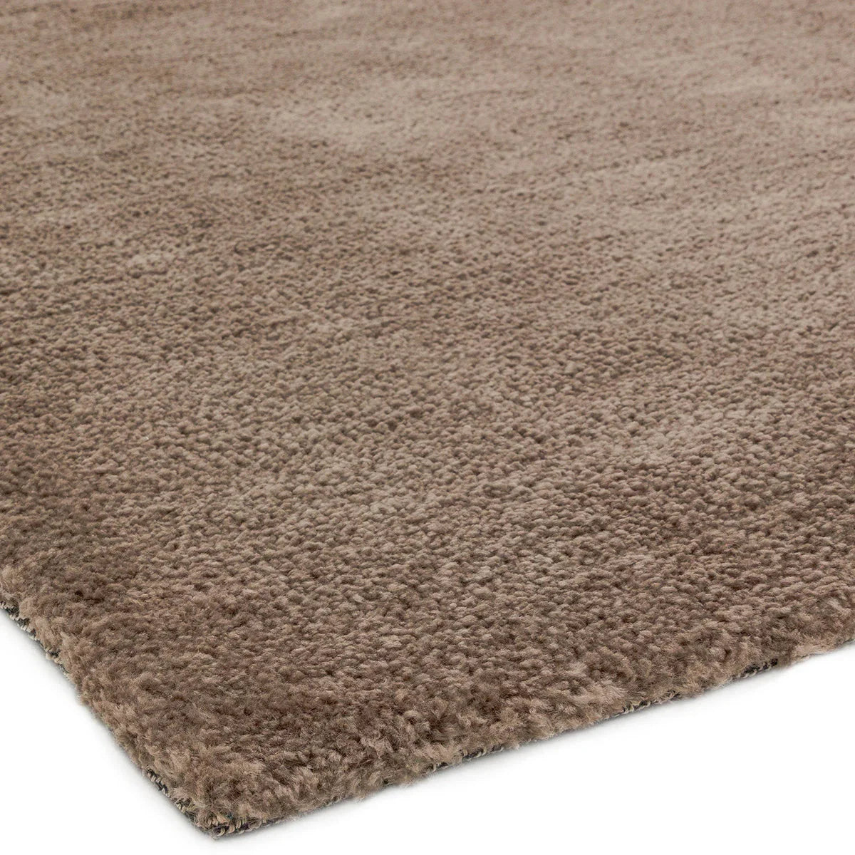 Asiatic Milo Mink Designer Rug featuring solid shag in mink brown on white background, machine-made polyester