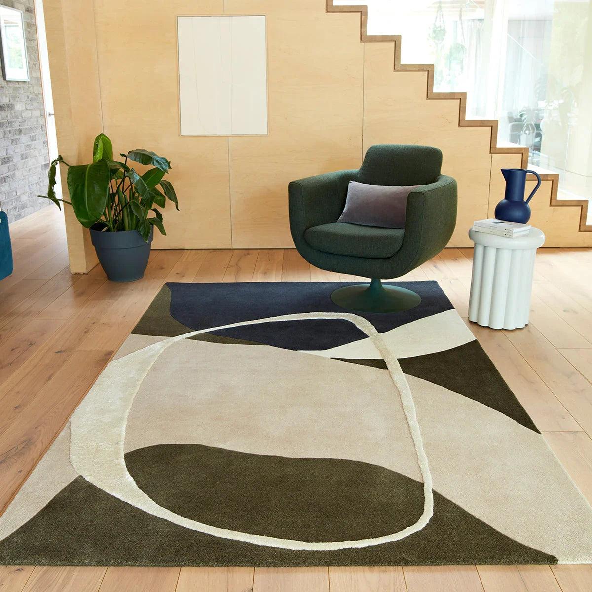 Asiatic Matrix Moss Designer Rug featuring abstract geometric pattern in cream, beige, taupe, olive and navy on light beige, hand-tufted wool