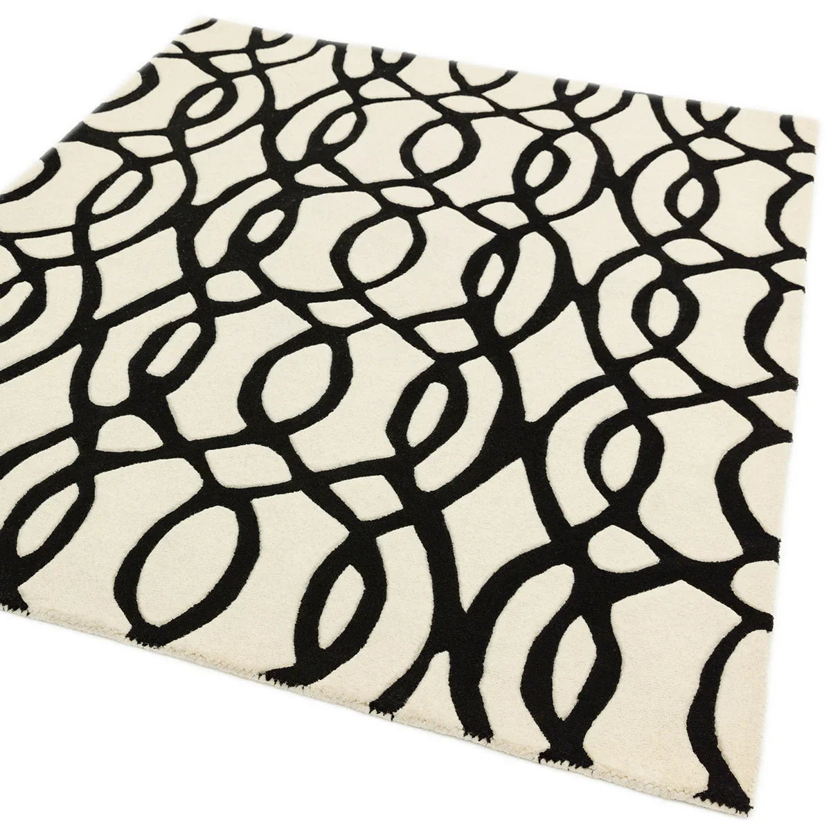 Asiatic Matrix Max Wire Rug featuring black looping pattern on cream background, machine-made polypropylene